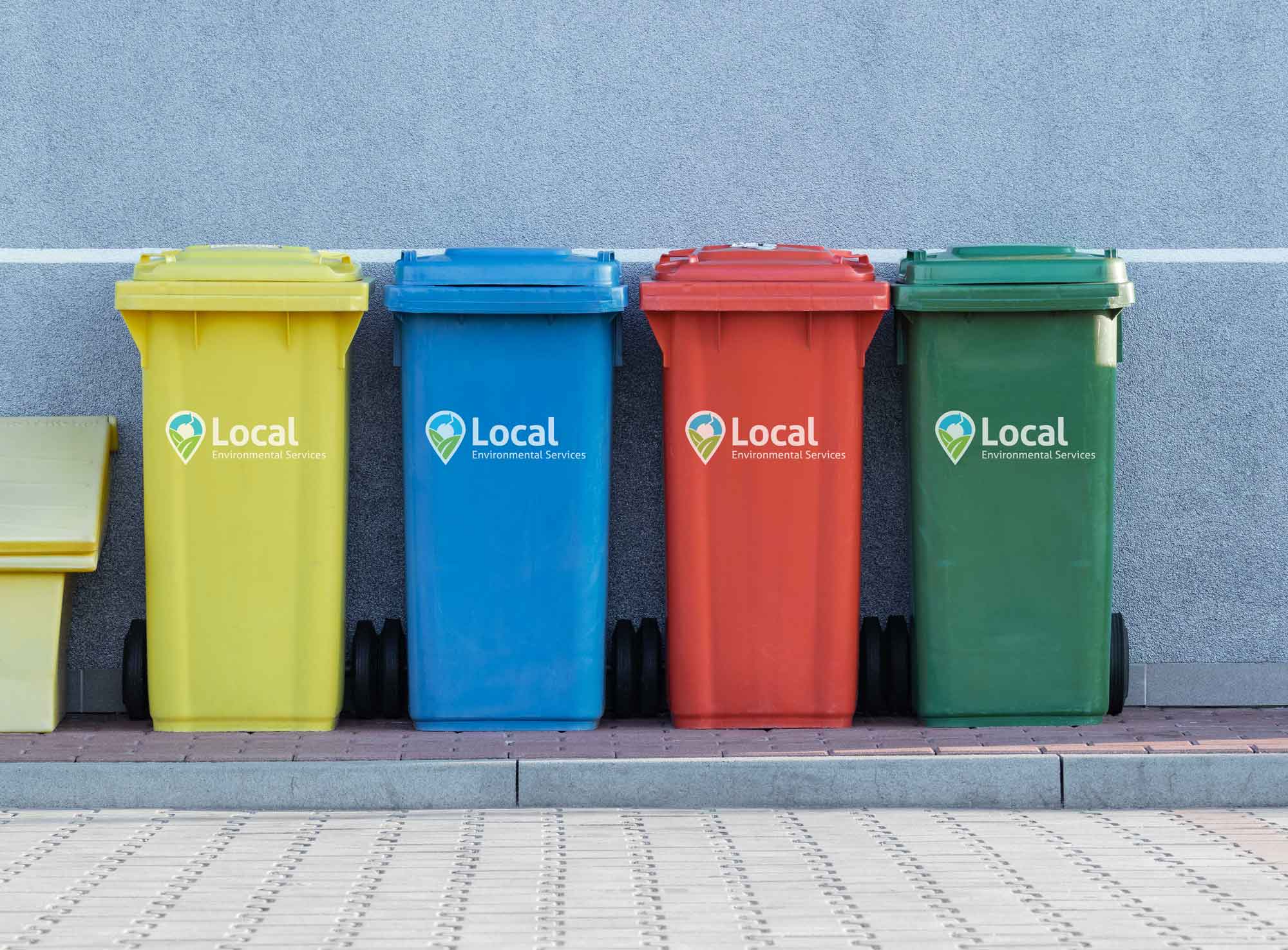 4 residential garbage bins lined up