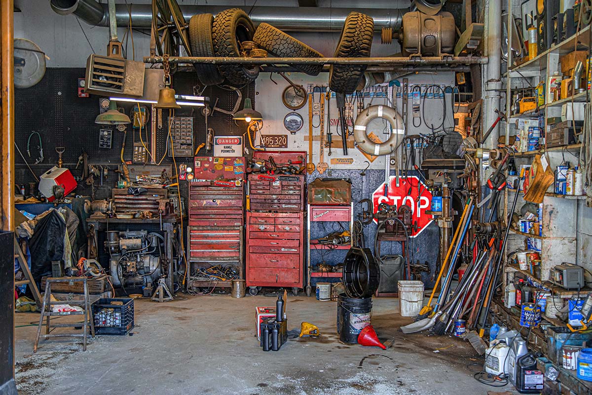 A cluttered and messy garage.
